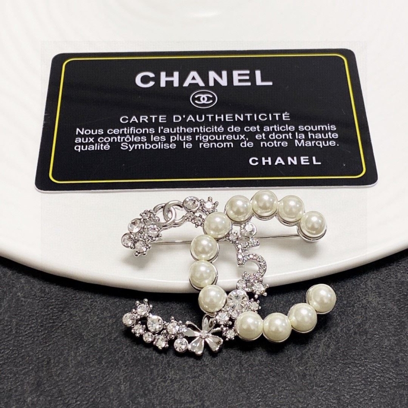 Ch**el brooches